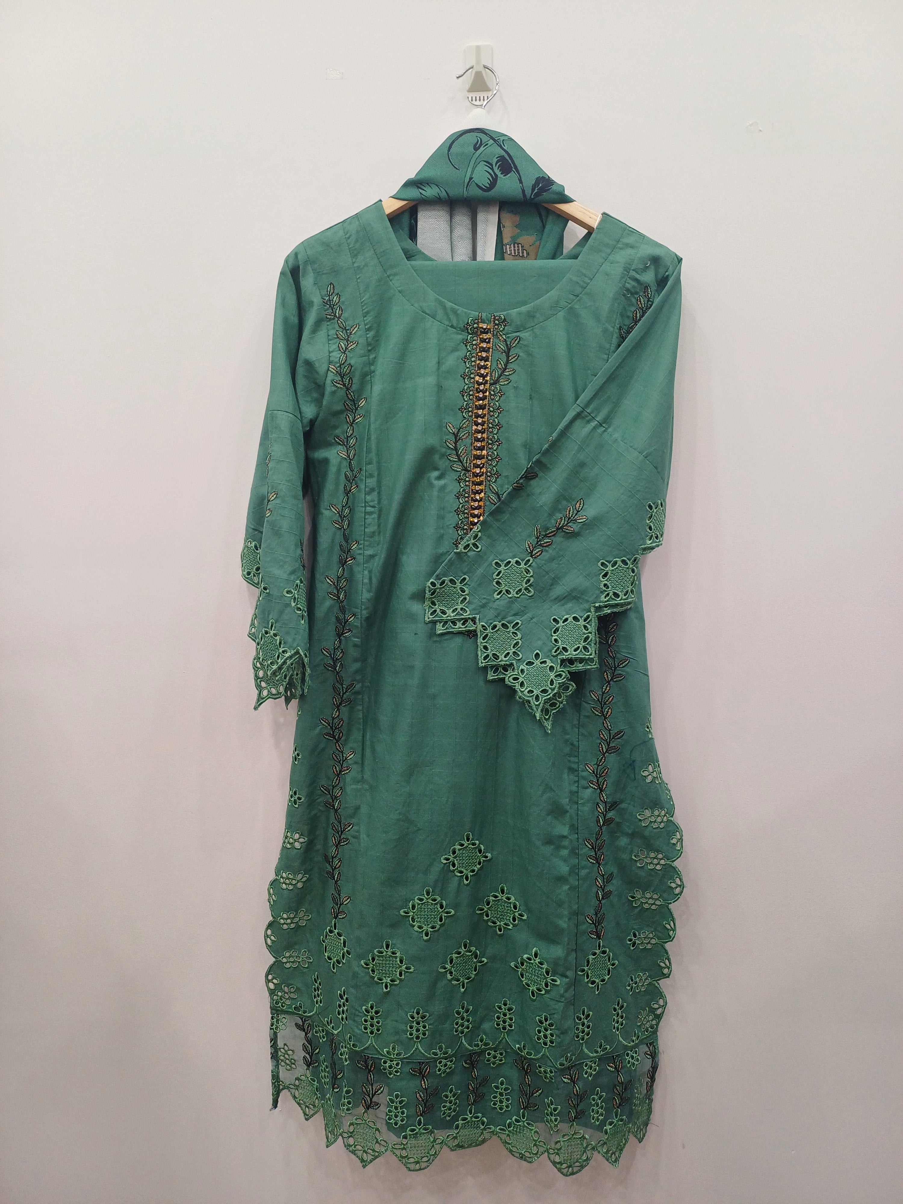 Full view of green embroidered kurta set with dupatta
