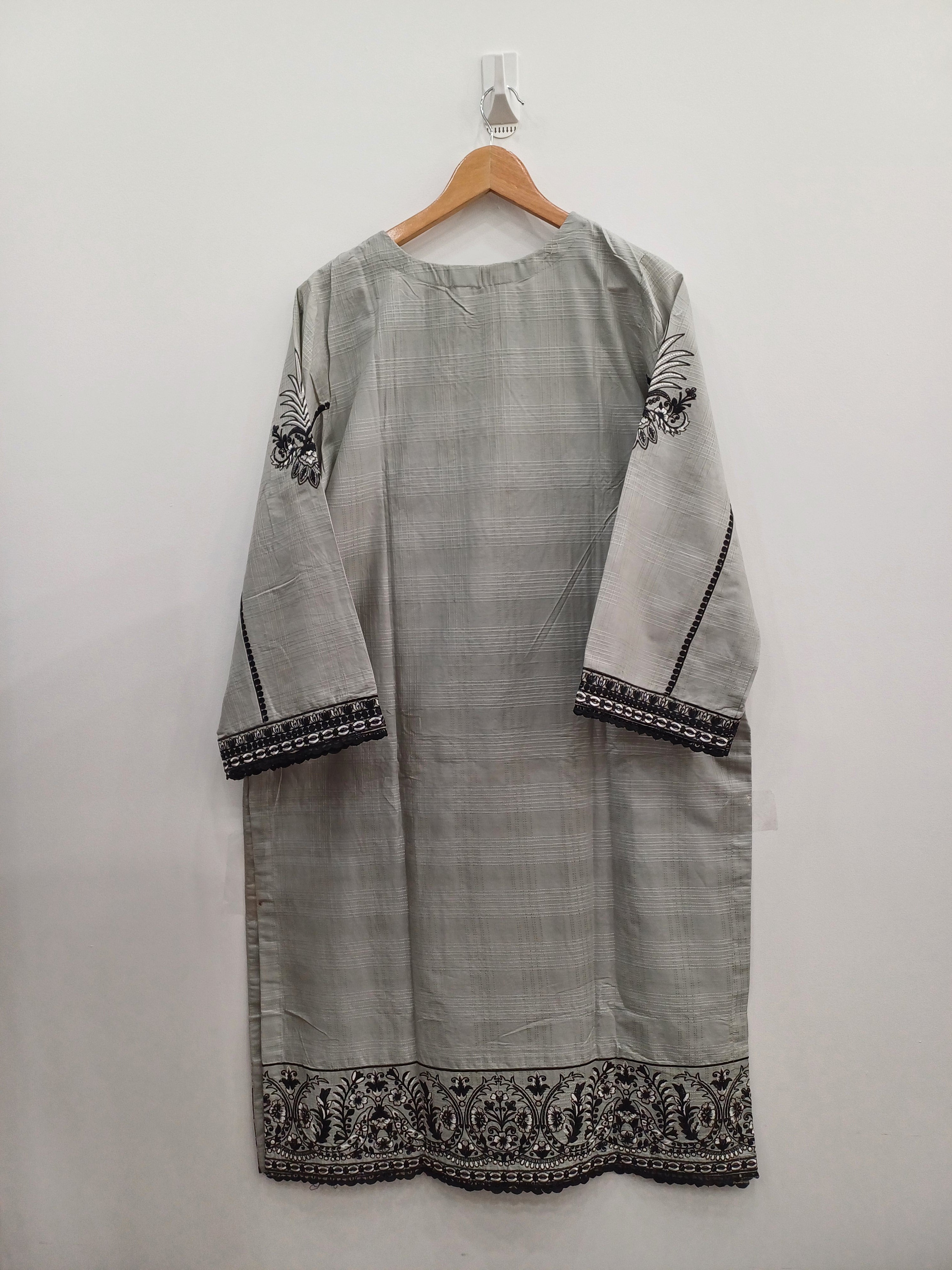 Back view of the gray embroidered kurta and trousers with matching black Khaddi net dupatta