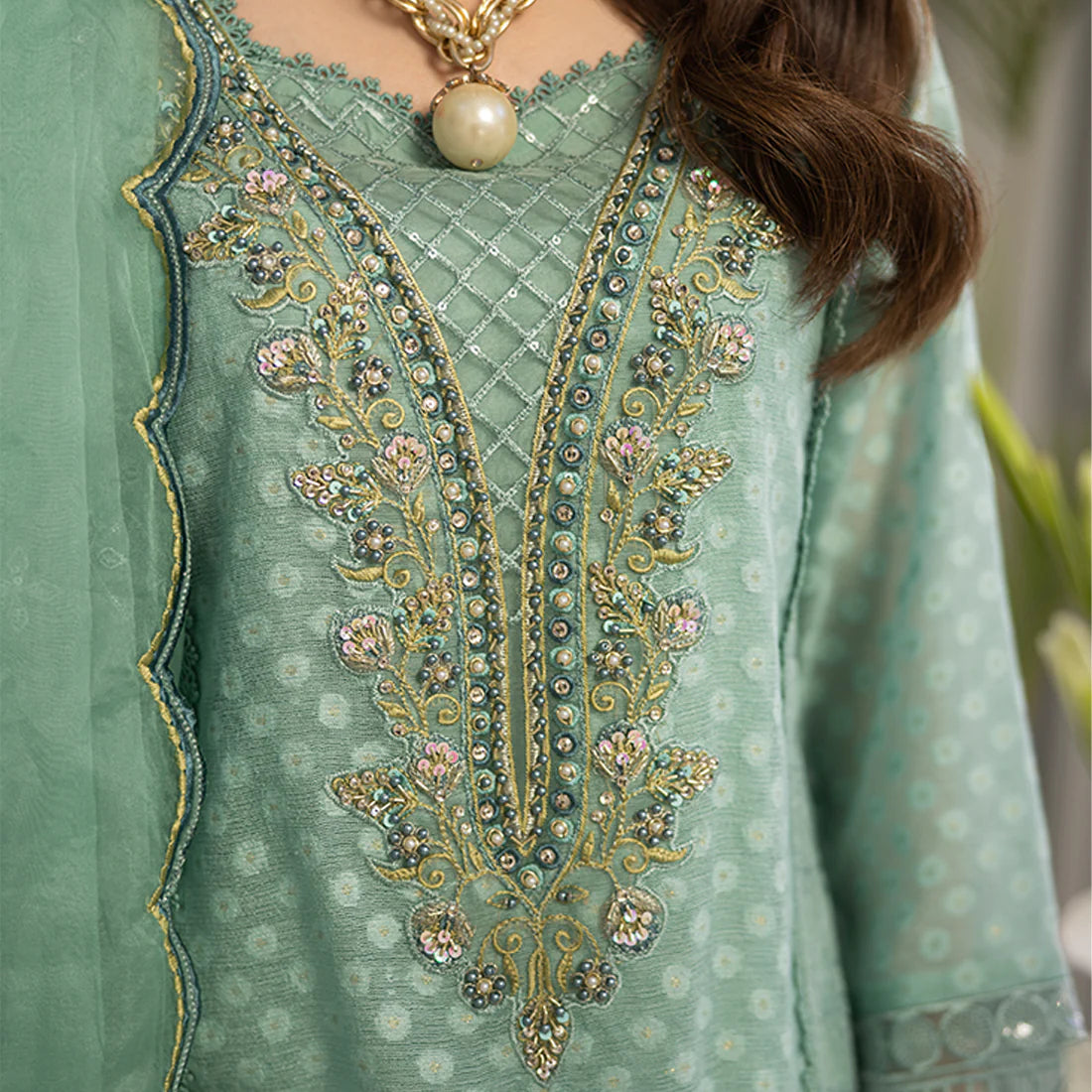 Aqua hand-embellished Khaddi Cotton Net shirt with embroidered border, organza dupatta with embroidered pallu, and Russian Grip trouser
