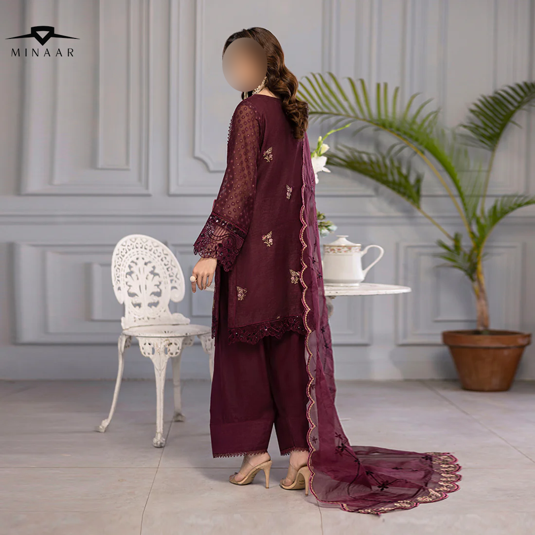 Plum base hand-embellished cotton net shirt with embroidered border, organza dupatta with finished pallu, and Russian Grip trouser
