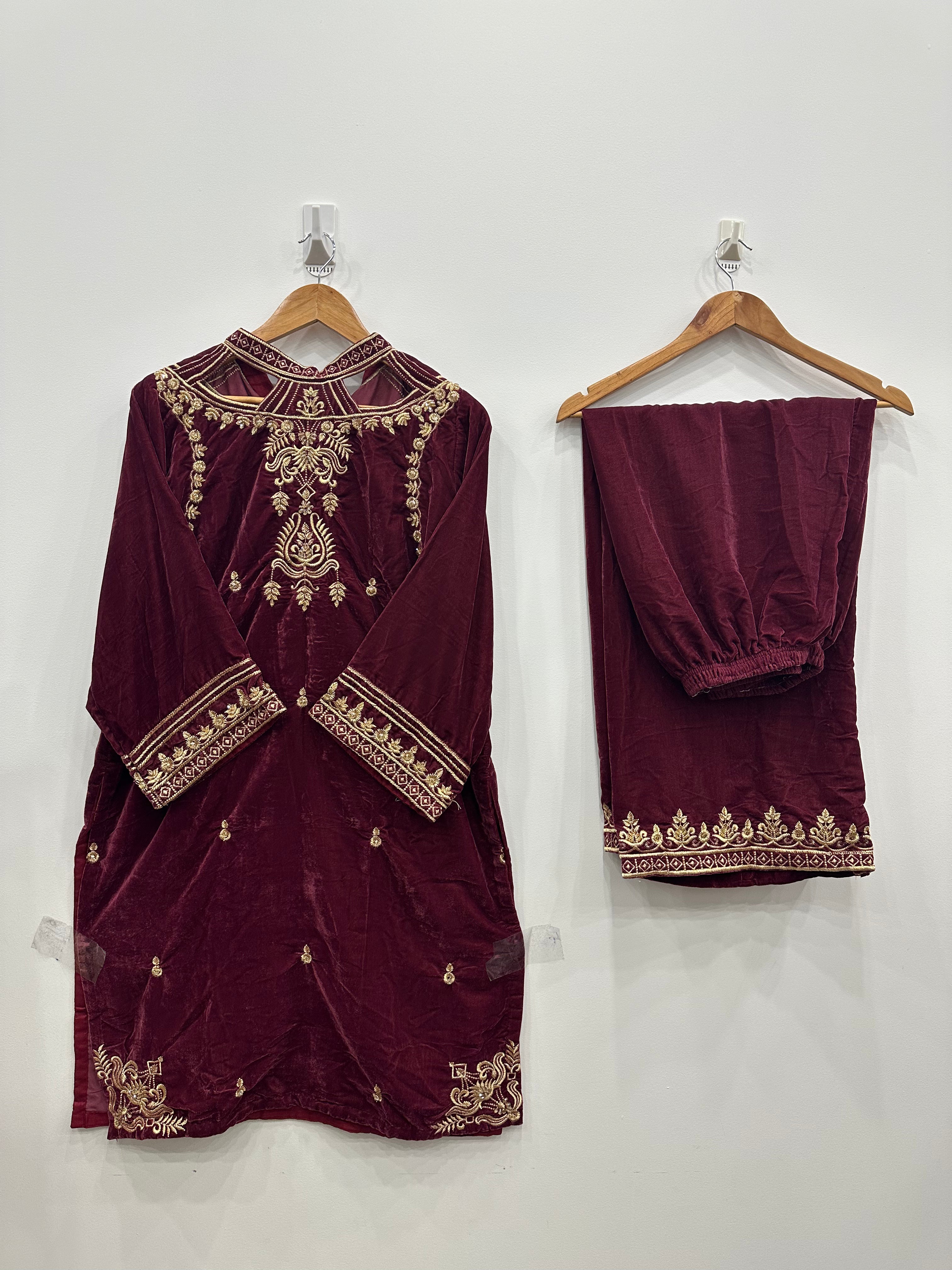 Maroon velvet kurta set with fancy embroidered neckline, tila work, beads, pearls, and embroidered shawl