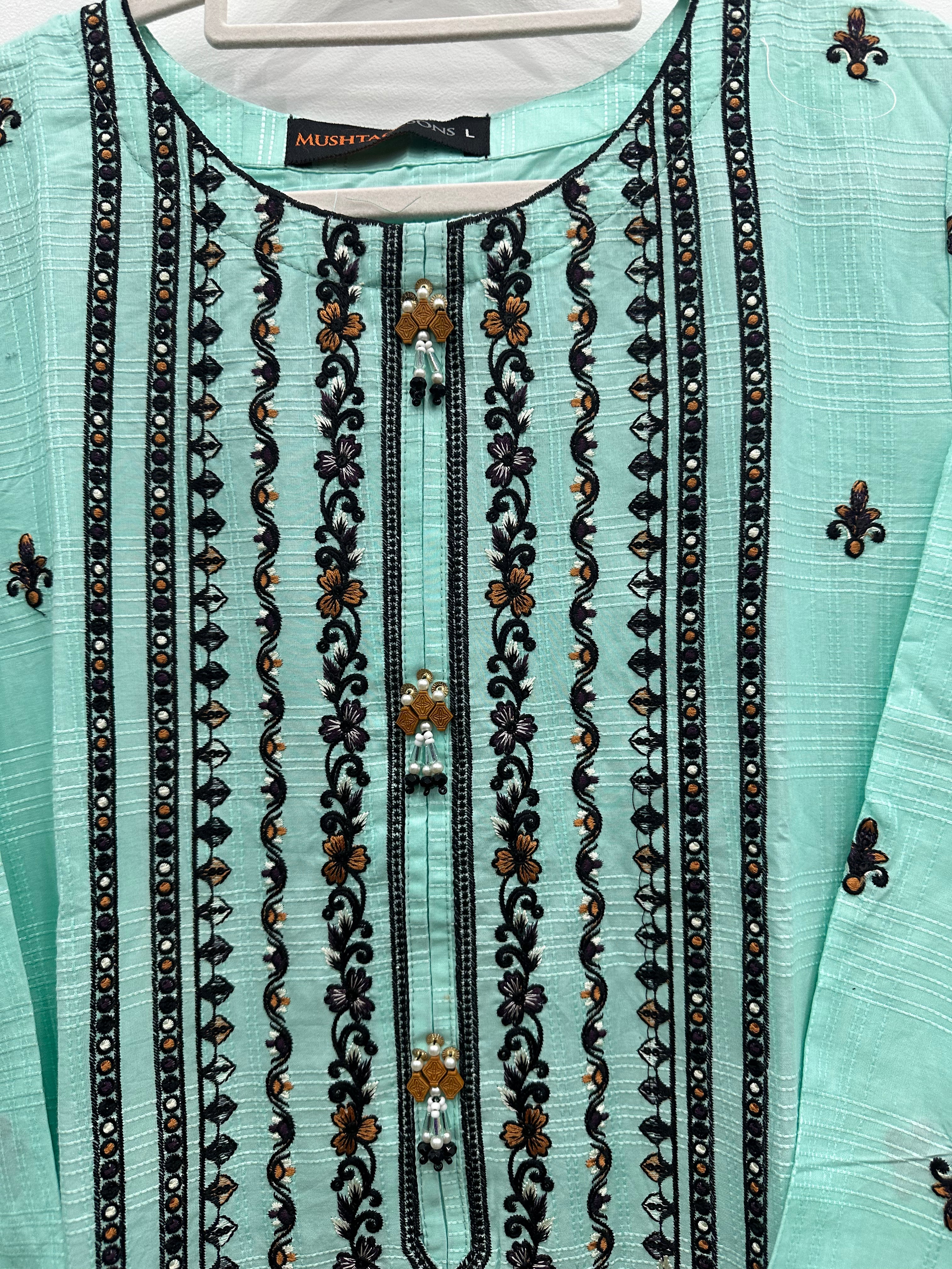 Close-up black embroidery on aqua slub cotton kurta front