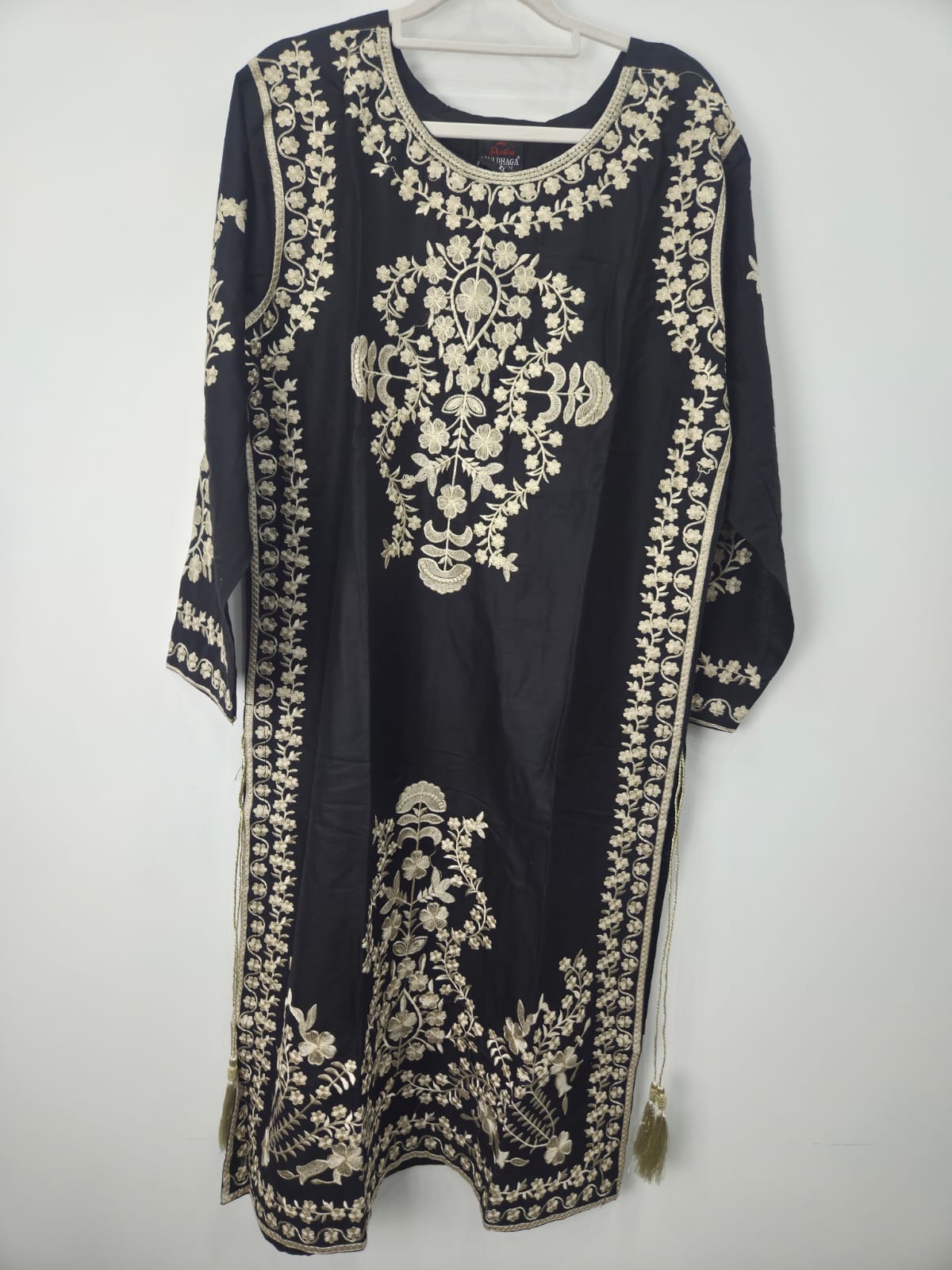Black cotton lawn shirt with skin embroidery and side tassels