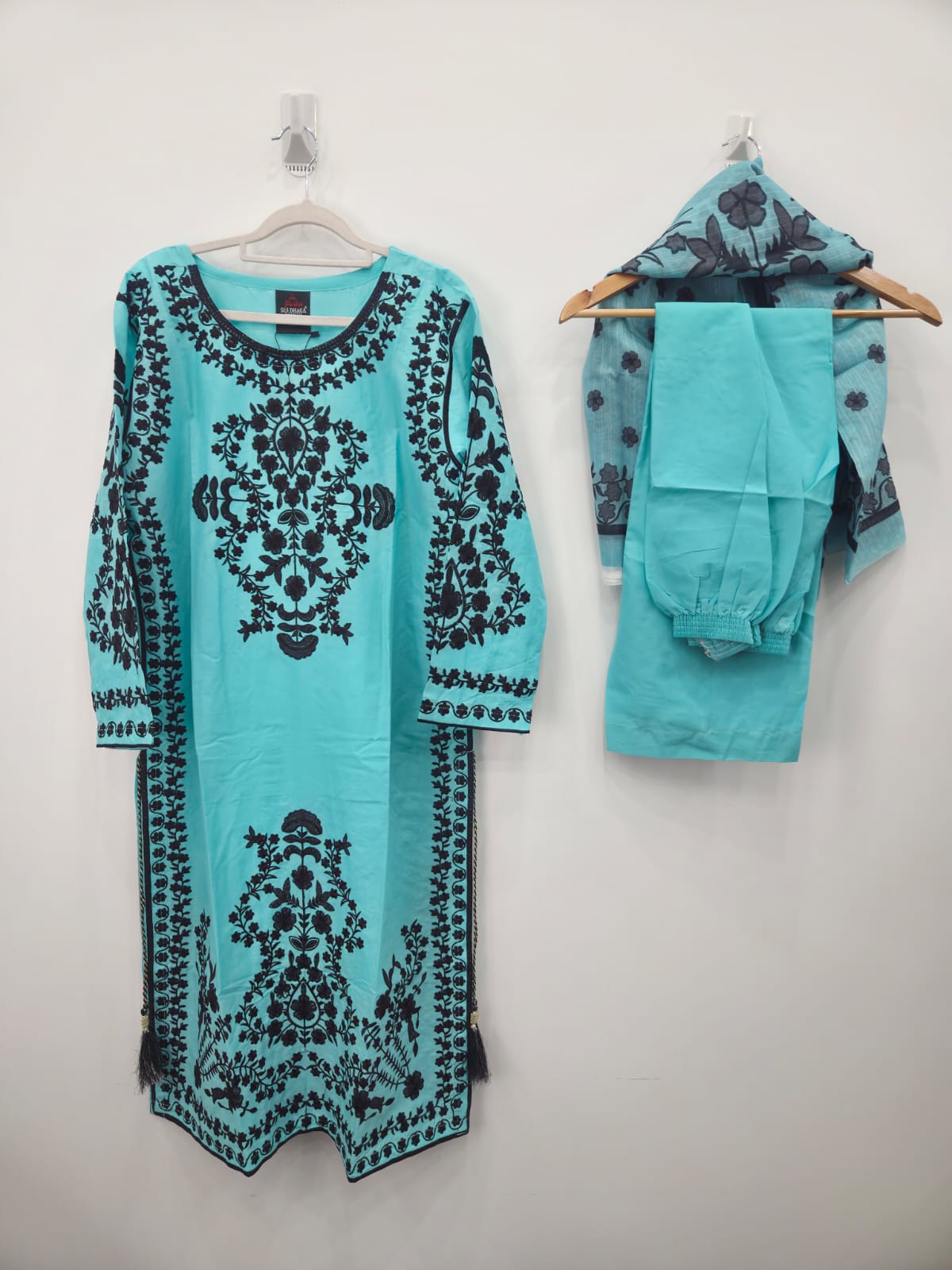 Aqua cotton lawn shirt with black embroidery front and side tassels