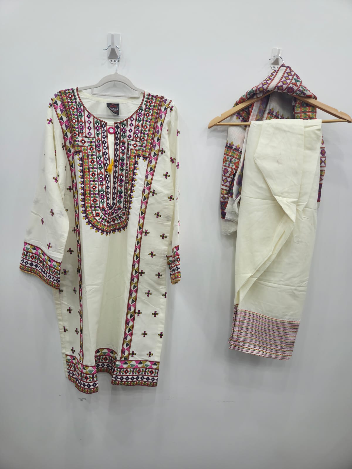 White cotton lawn shirt with multi embroidery and farshi shalwar, paired with printed diamond dupatta