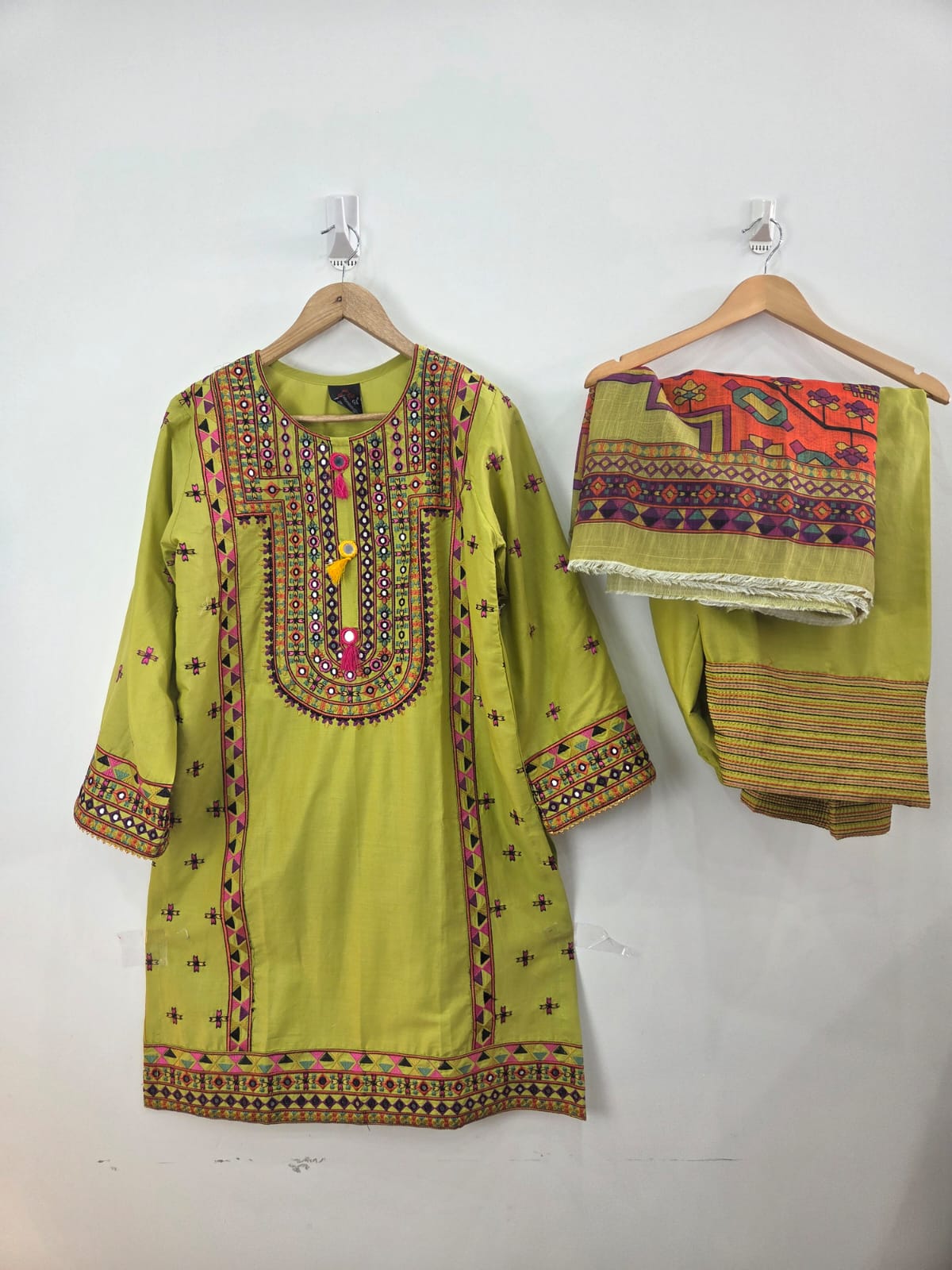 "Parrot green cotton lawn shirt with multi embroidery, paired with embroidered farshi shalwar and diamond dupatta