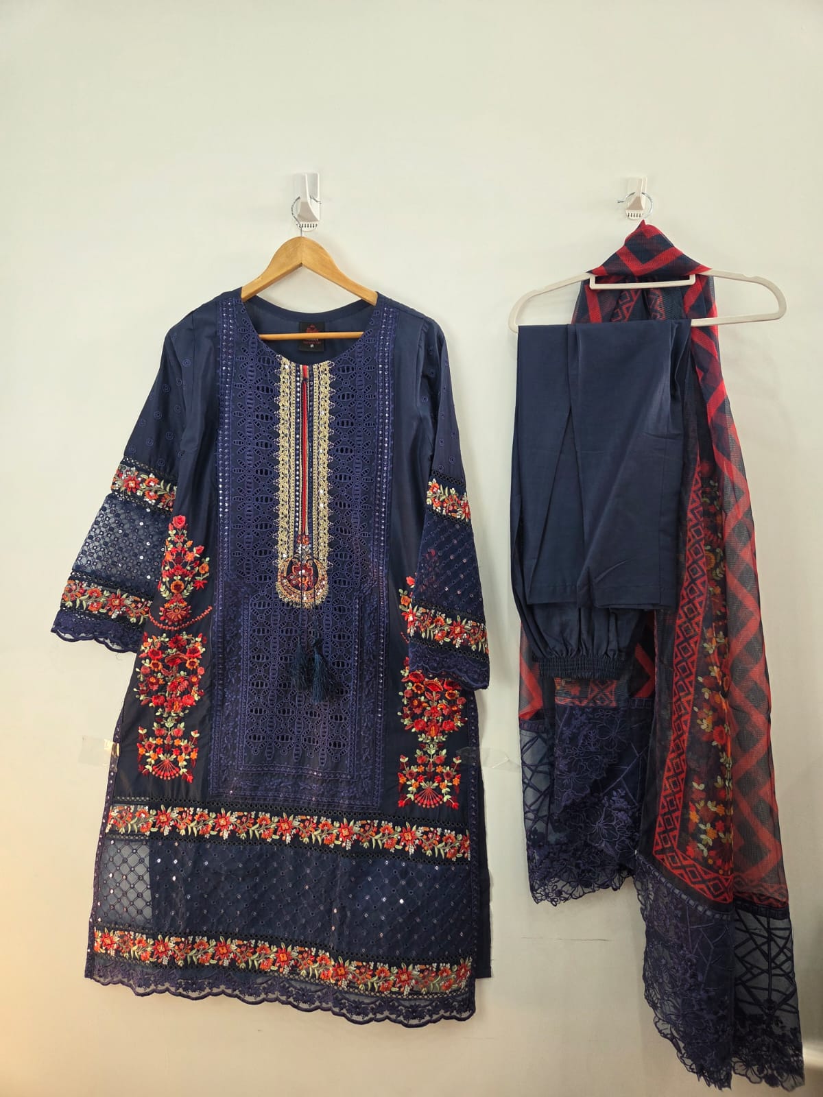 Navy blue cotton lawn shirt with chikankari embroidery, sitari work, and printed khaddi net dupatta