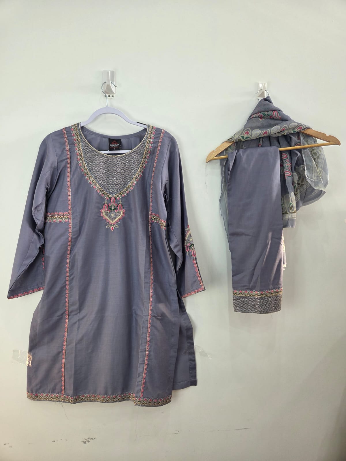 Gray cotton lawn shirt with pink embroidery and tila work, paired with printed dupatta