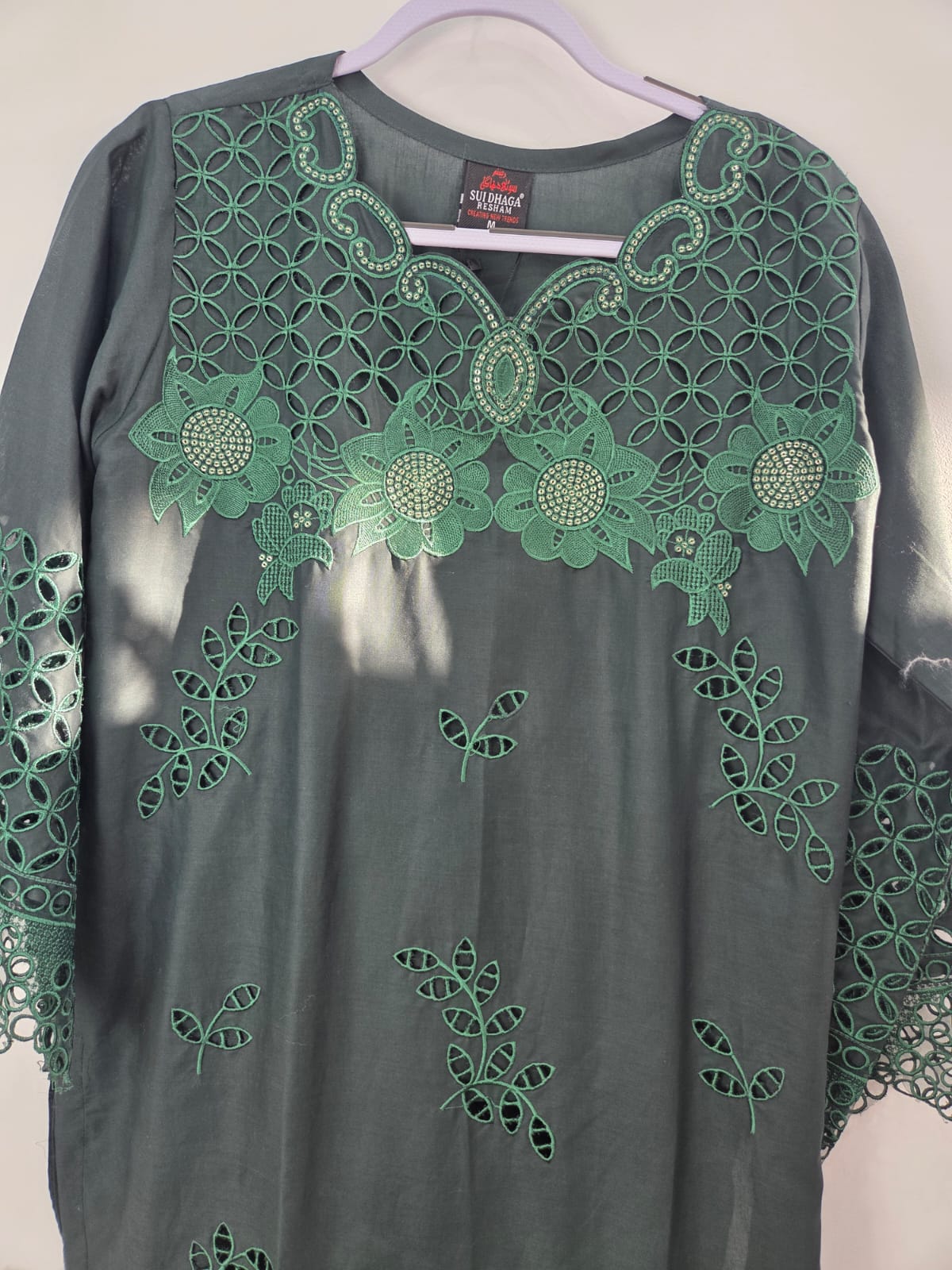 Green lawn shirt with sitari embroidery, sleeve cutwork, lace, paired with lawn and printed organza dupatta