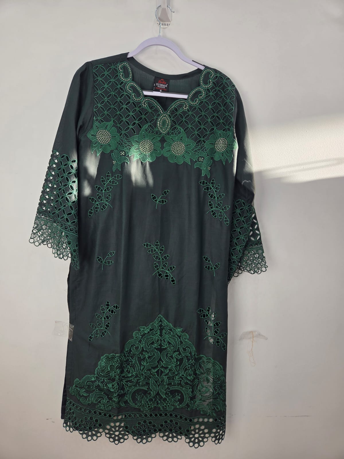 Green lawn shirt with sitari embroidery, sleeve cutwork, lace, paired with lawn and printed organza dupatta