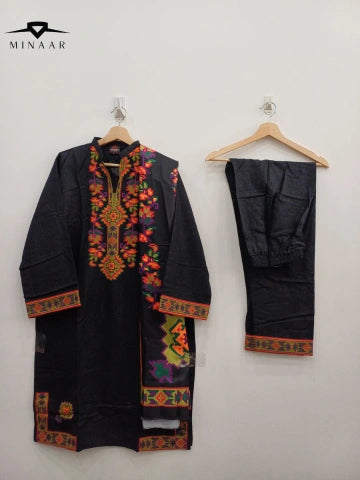 Close-up of neckline embroidery with multicolor floral detailing