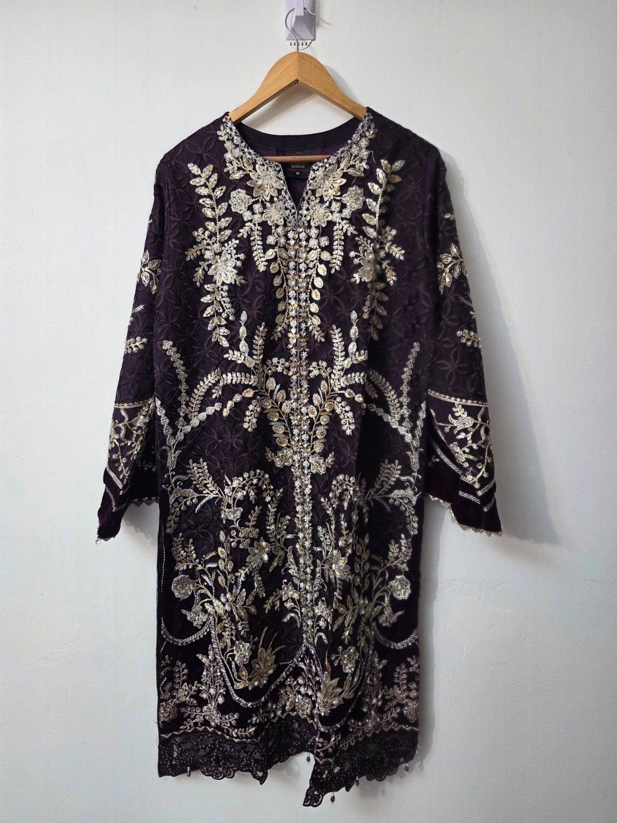 Deep purple embroidered organza Pakistani suit with stone work