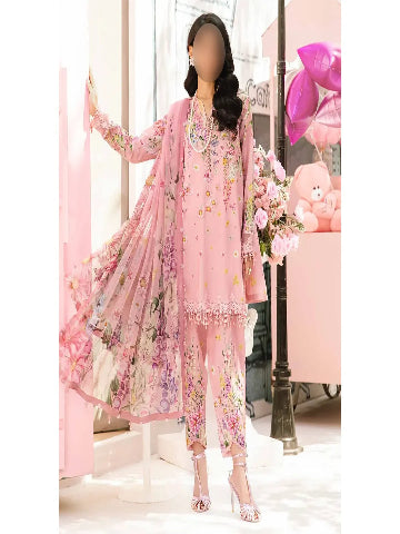 Woman wearing a pink floral outfit with a blurred face in a decorated room.