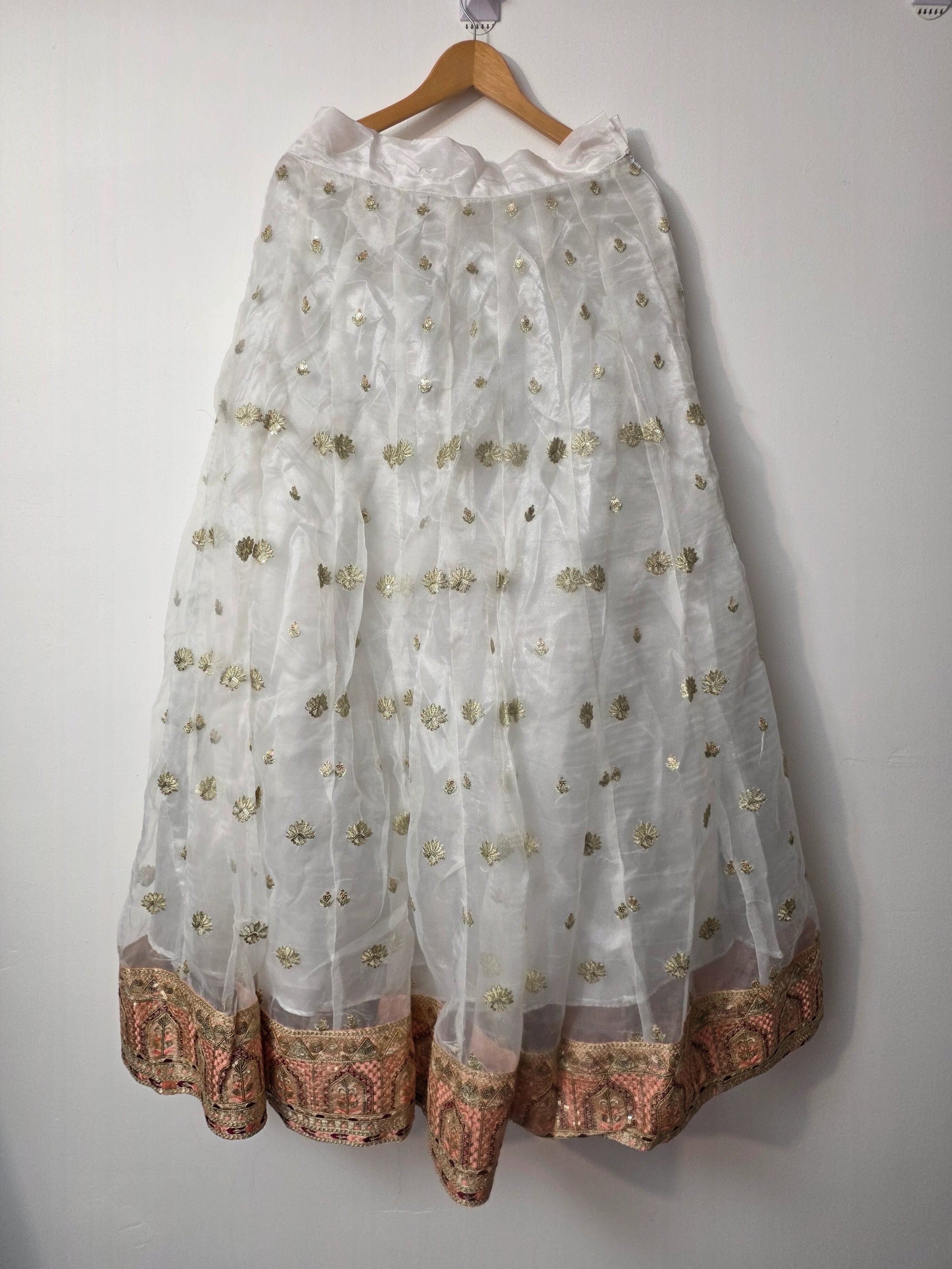Heavy embroidered organza lehenga with detailed border