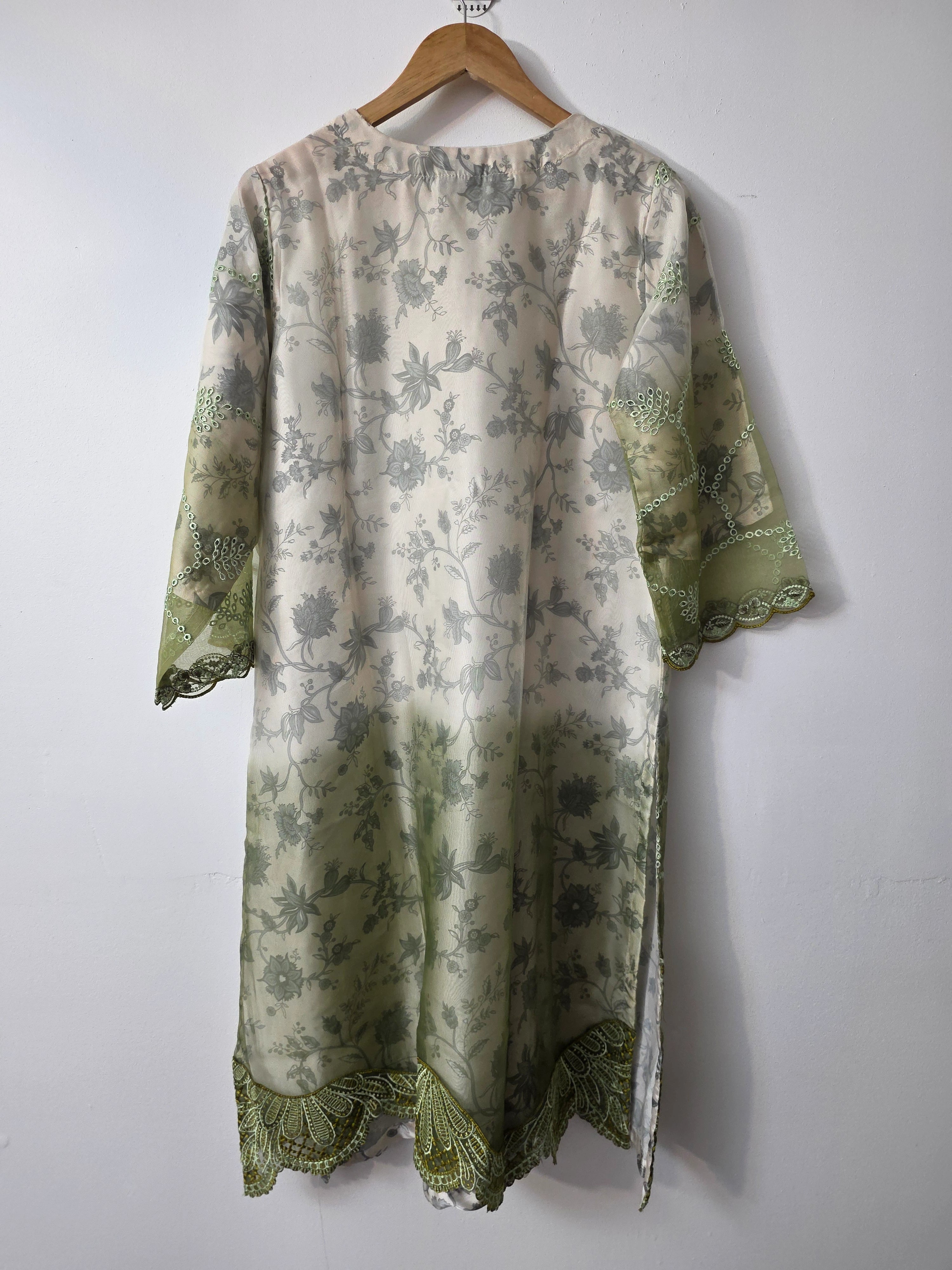 Mint green embroidered Pakistani dress with pearl work