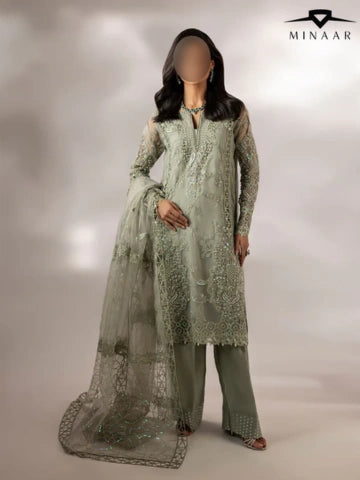 Woman wearing a light green embroidered outfit with a dupatta, branded 'Minaar', on a neutral background.