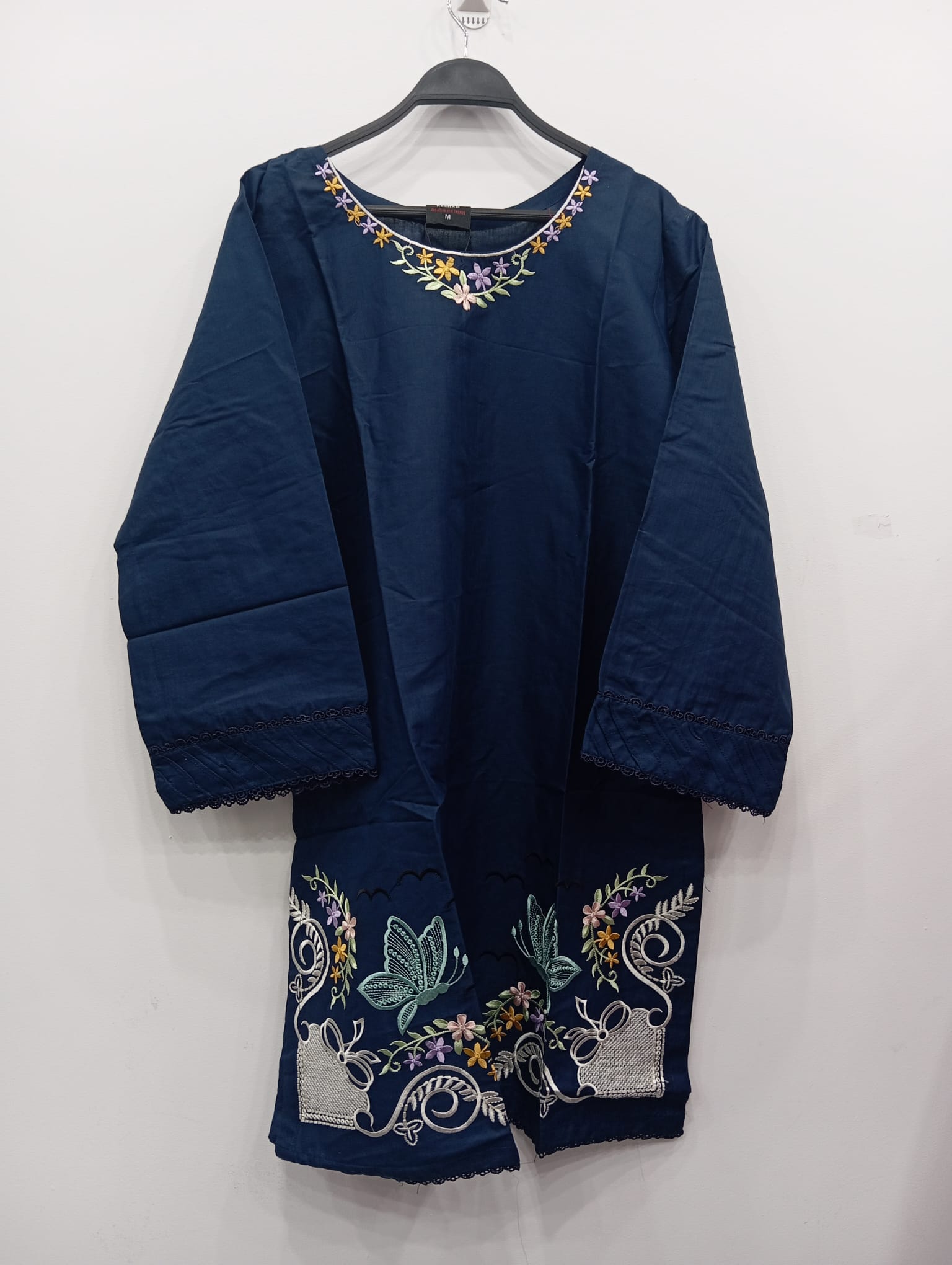 Navy blue embroidered lawn kurta with multicolor floral neckline and front embroidery