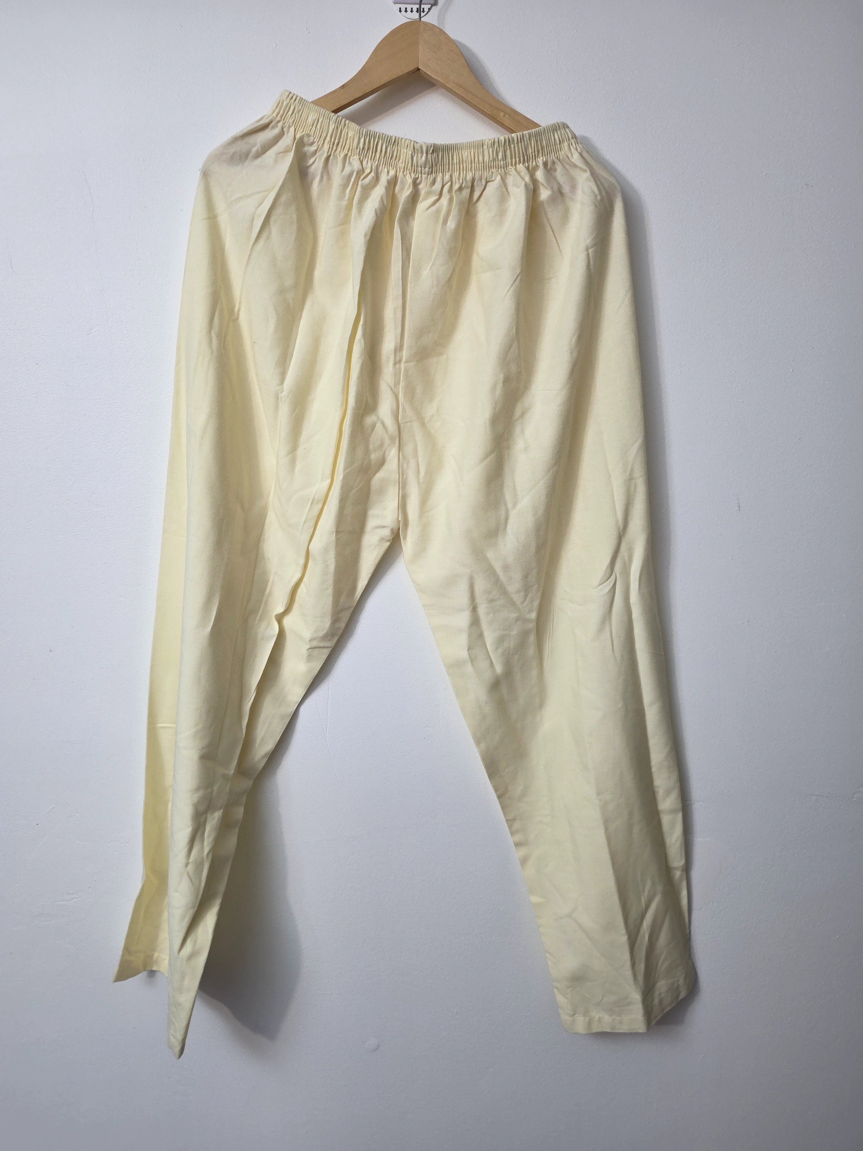 Off white cotton Pakistani suit with embroidered shirt and sleeves