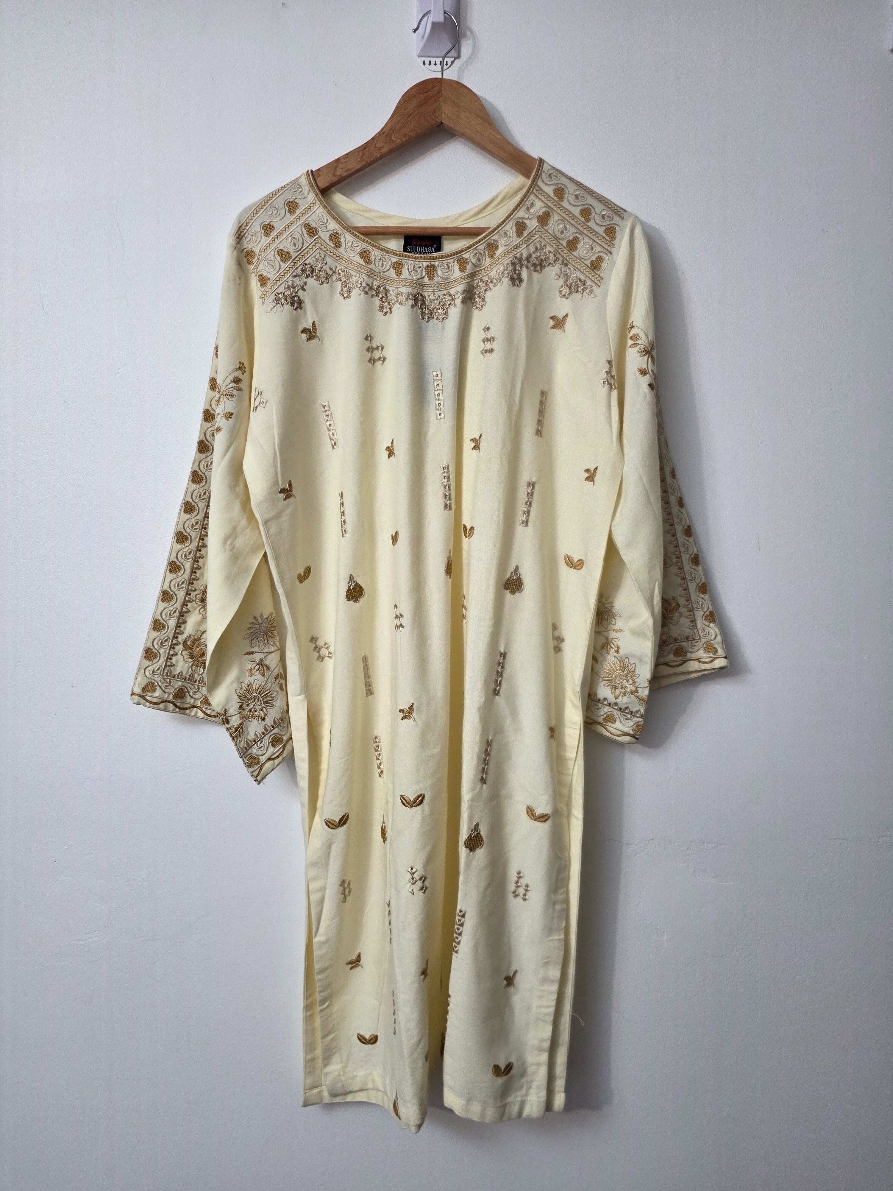 Off white embroidered Pakistani suit with matching winter shawl