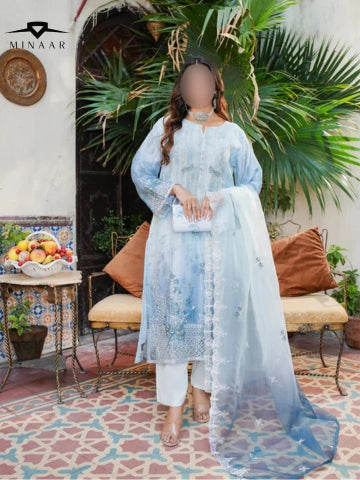 Organza_shirt_printed_silk_inner_embroidered_dupatta_and_silk_trouser_neatly_folded