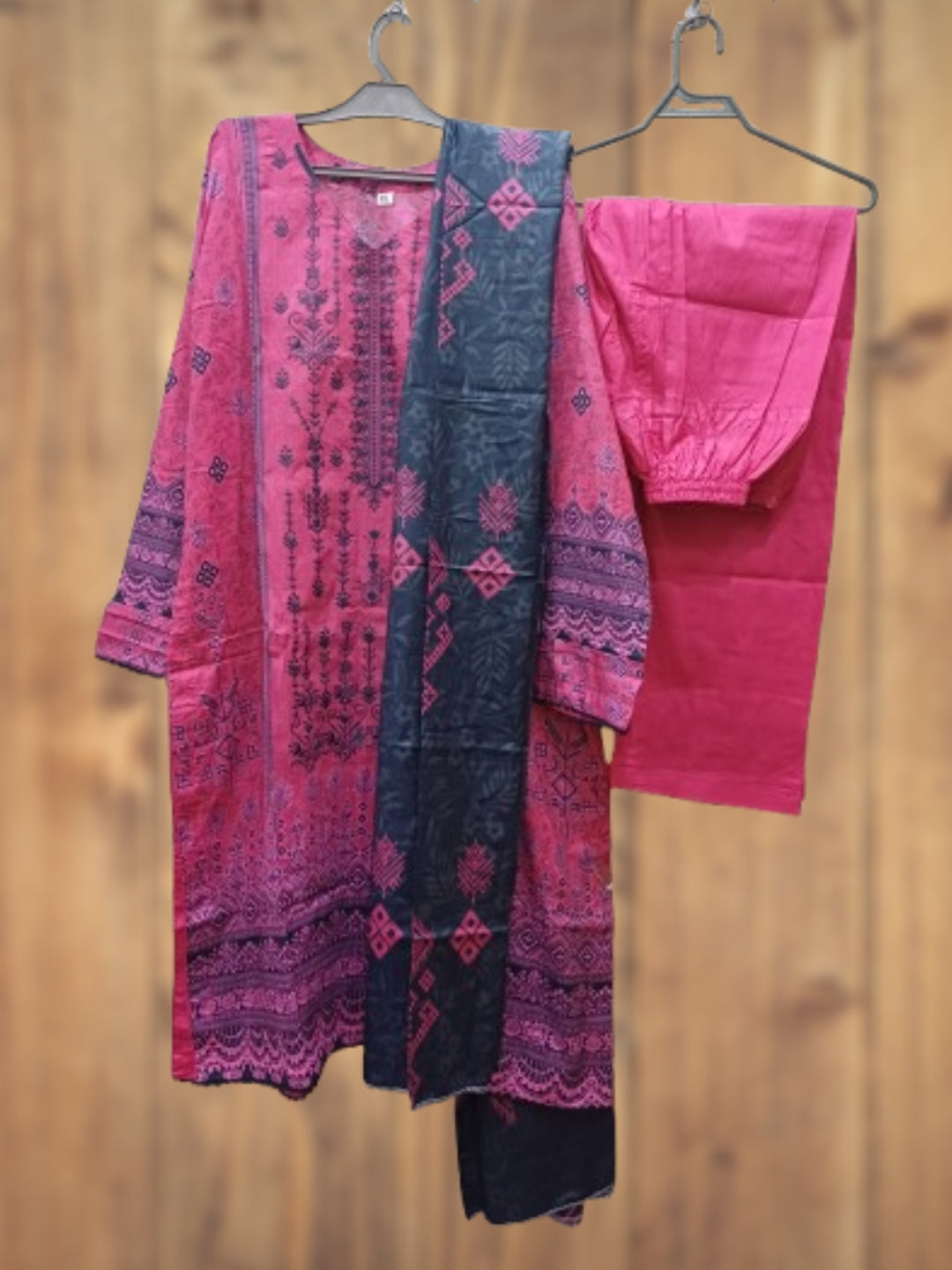 Pink embroidered Pakistani lawn 3 piece suit with navy printed lawn dupatta and lawn trouser