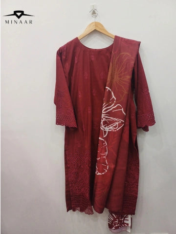 Red kurta with floral design on a hanger against a white background, branded 'Minaar'.