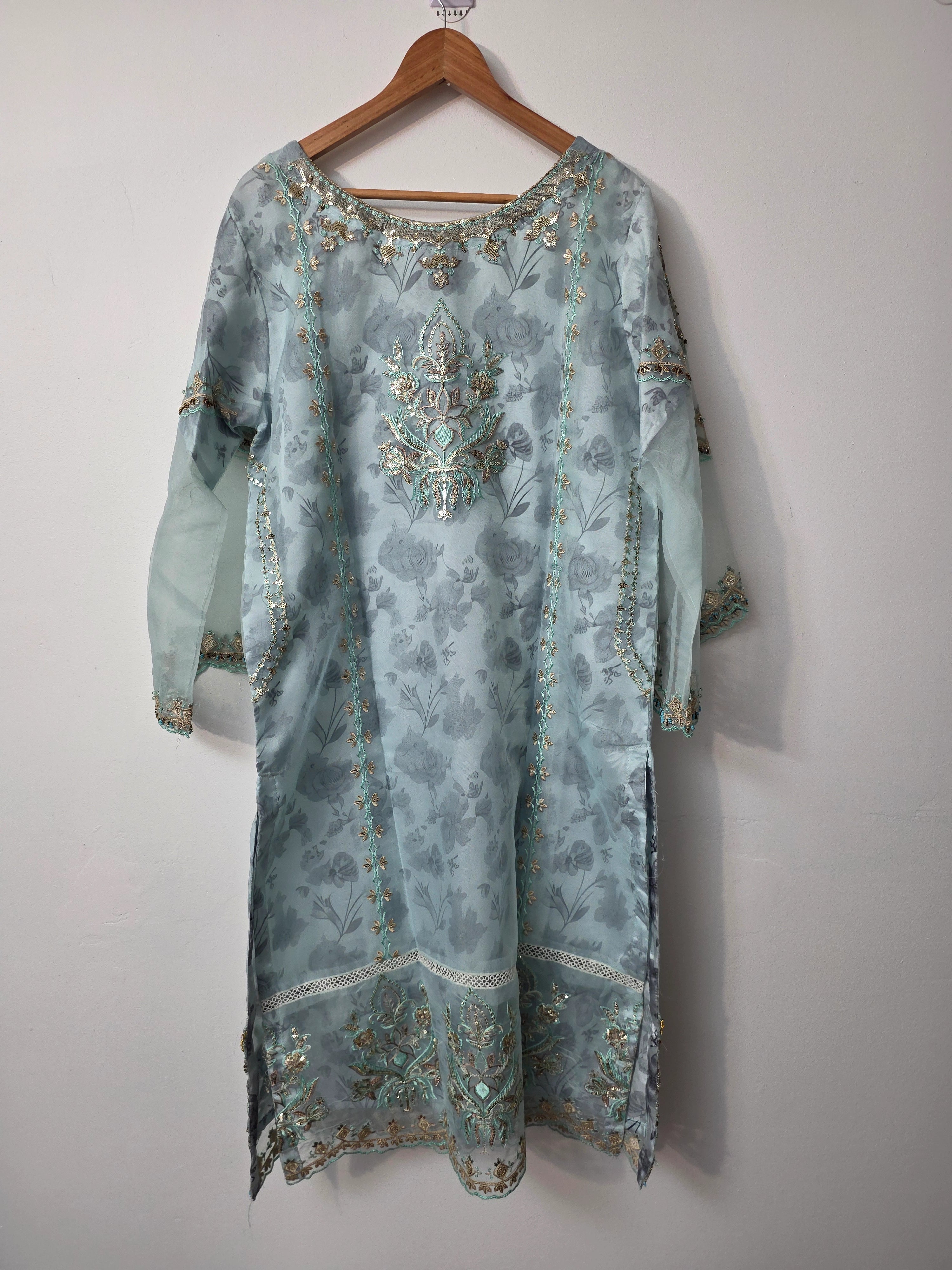 Sky blue embroidered Pakistani dress with delicate pearl work
