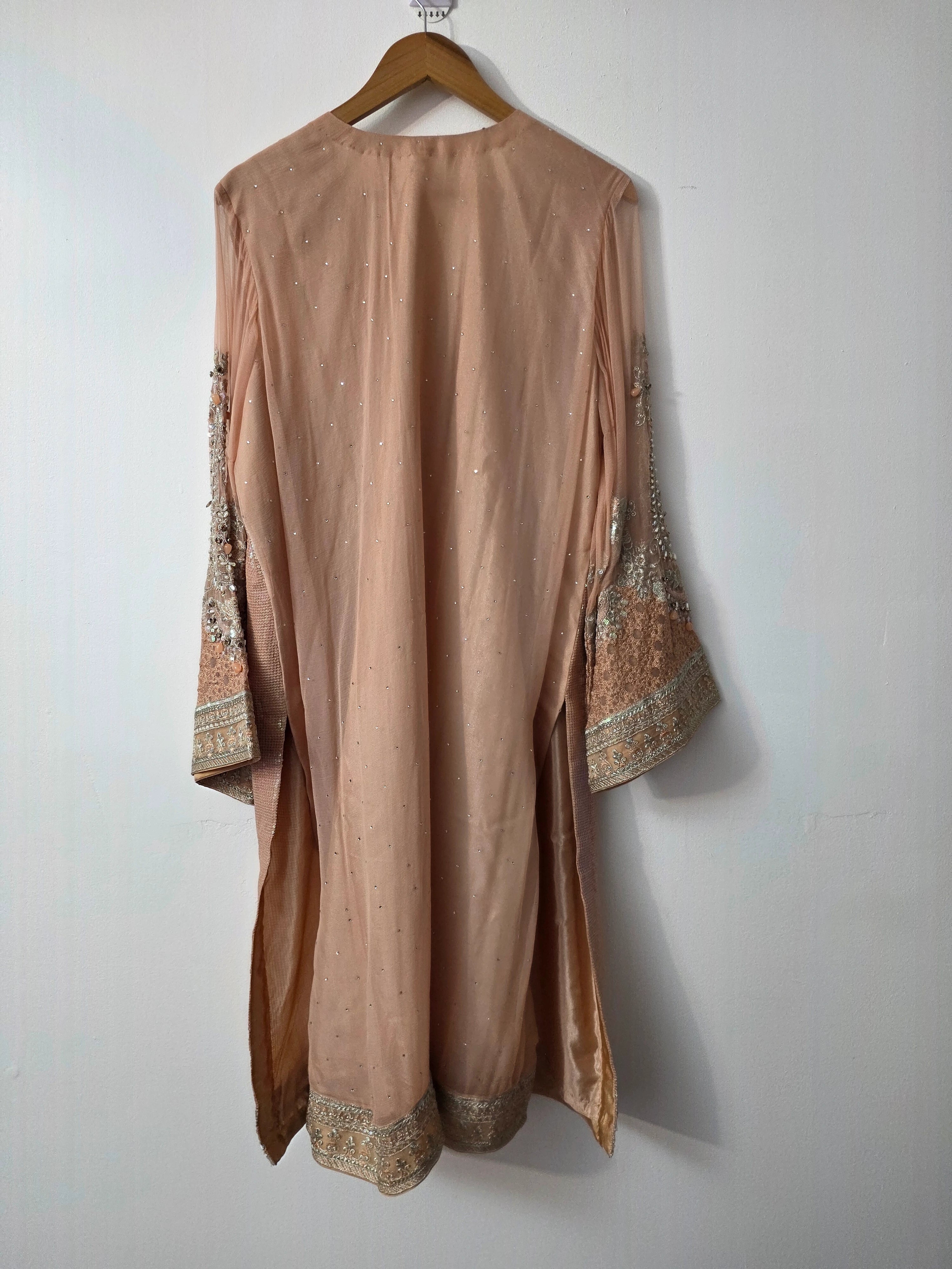 Tea pink wedding guest outfit with stonework and embroidered chiffon dupatta