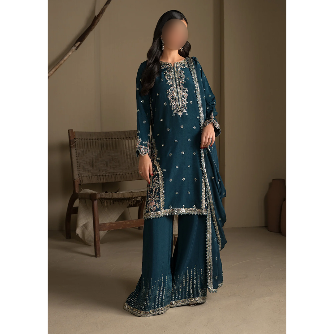 Teal embroidered kurta with flared raw silk trouser