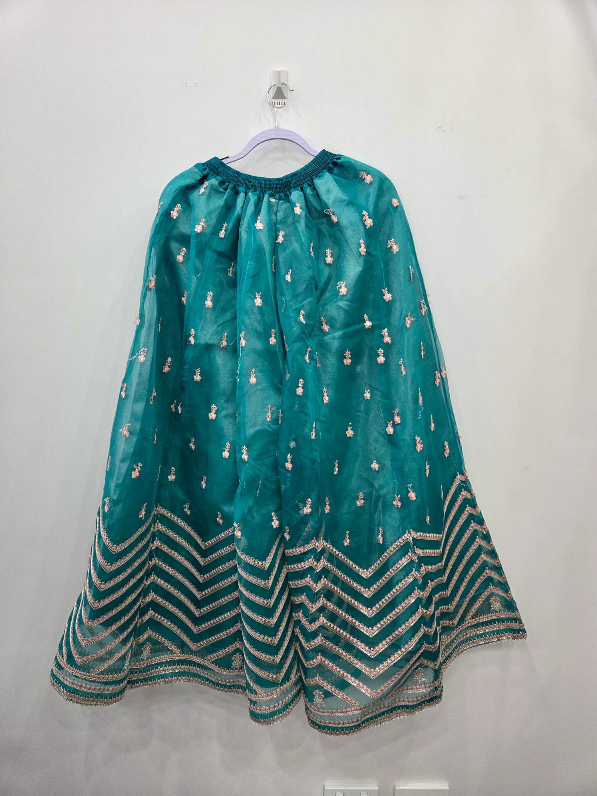 Teal embroidered organza flared bottom with pearl detailing and chevron border