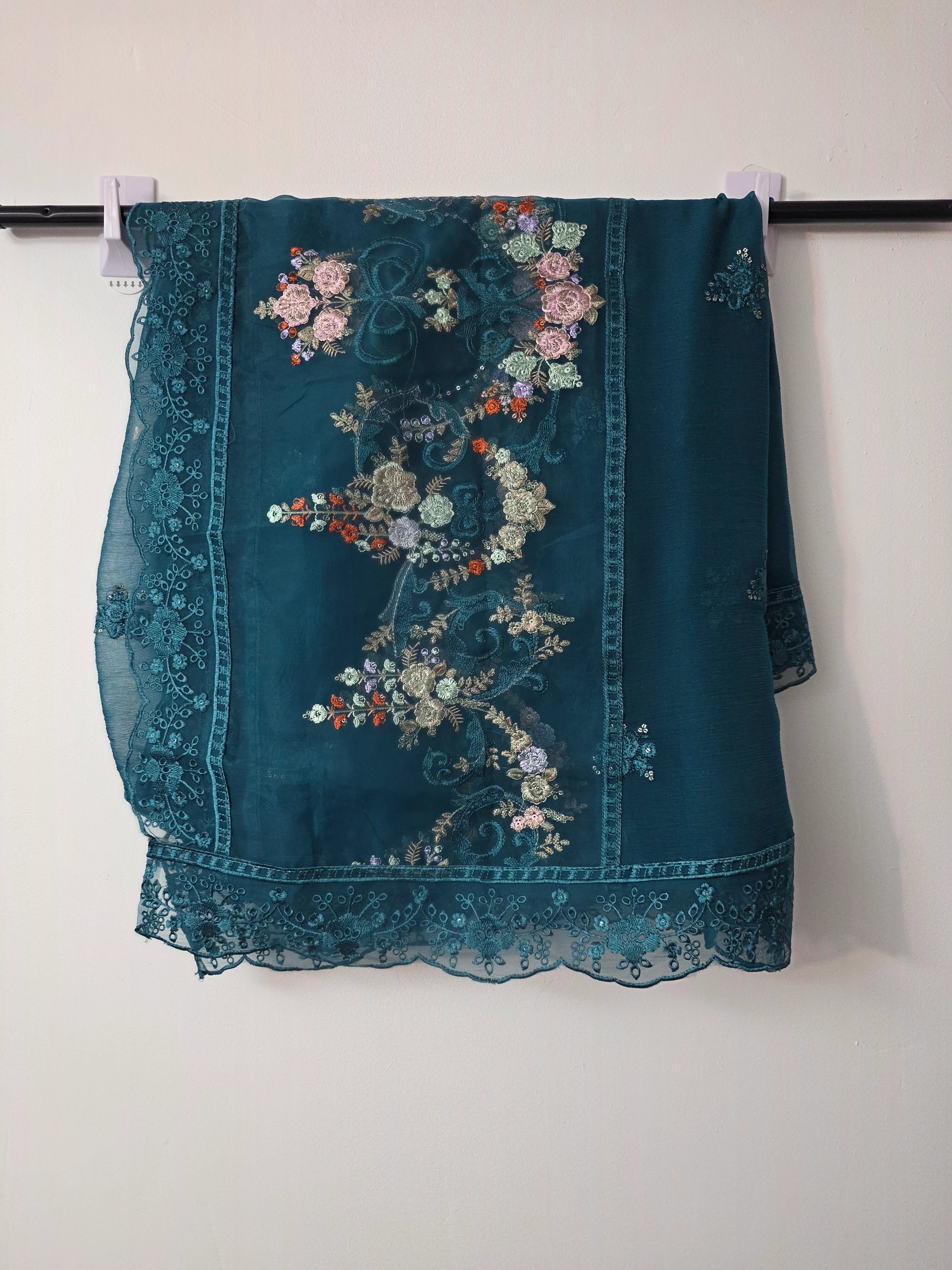 Teal formal Pakistani dress with panel embroidery and organza border