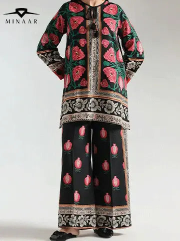 Traditional outfit with floral patterns on a plain background, featuring the Minaar brand.