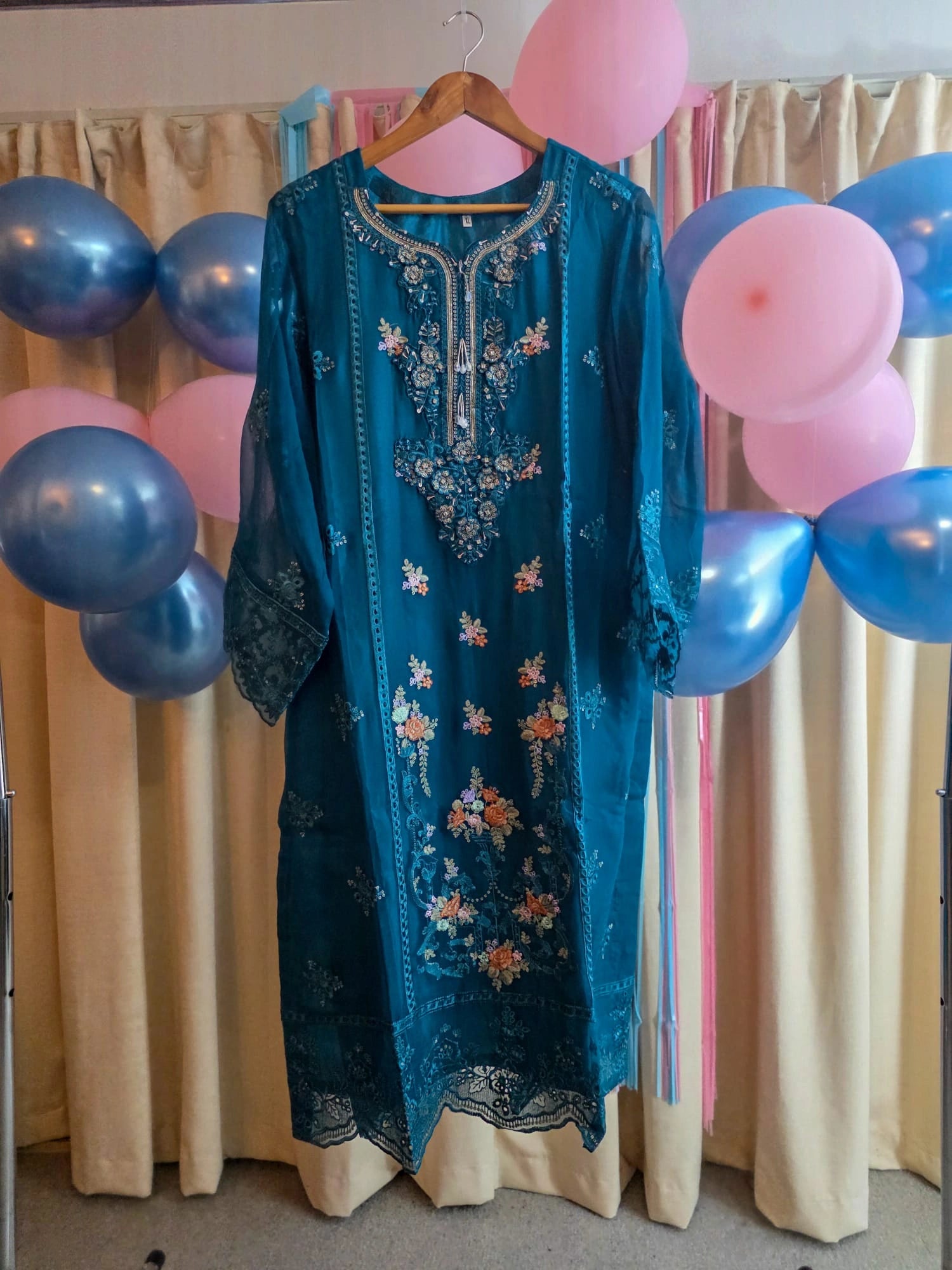teal embroidered shirt